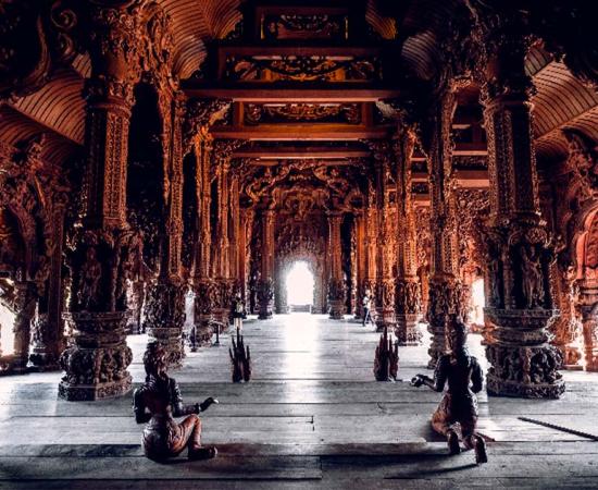 Thailand, Pattaya December 2019 Fragment of the Temple of truth in Pattaya. A huge wooden temple with carved decorations. Buddhist temple. Source: Margarita Timofeeva/Adobe Stock