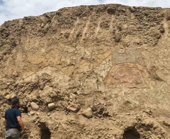 The knife-wielding spider god mural was discovered at a 3,200-year-old ceremonial site in Peru.