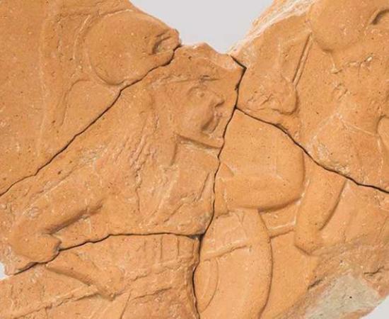 The 2,500-year-old terracotta relief discovered on St. Cyricus depicts marching hoplites. Source: National Institute and Museum of Archaeology