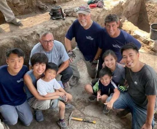 Archaeologists pose near the St Peter’s inscription found on the north shore of the Sea of Galilee, Israel, which could finally prove a number of things about the first apostle of Jesus. Source: El Araj Excavation Project