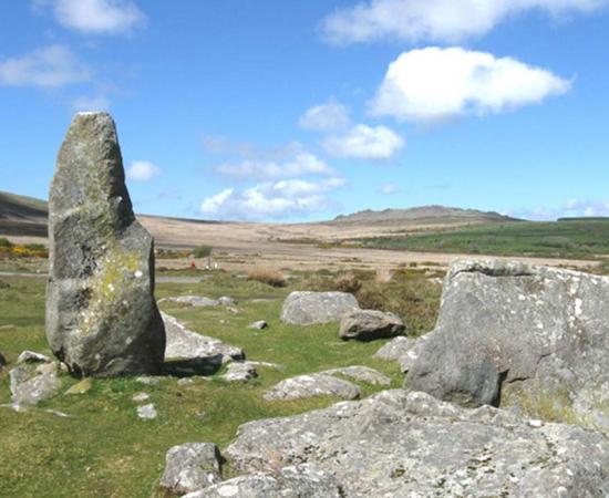 Mynydd Preseli hills and Waldo Williams memorial stone. The famous hills from where the bluestones of Stonehenge originated, pictured with the memorial monolith to poet Waldo Williams, 1904-1971