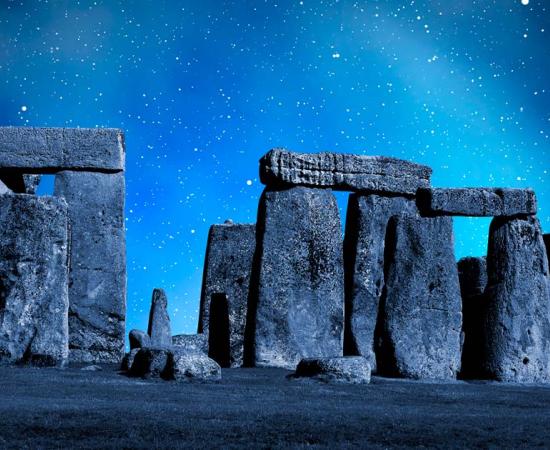 Stonehenge stargazers. Source: vencav / Adobe Stock.