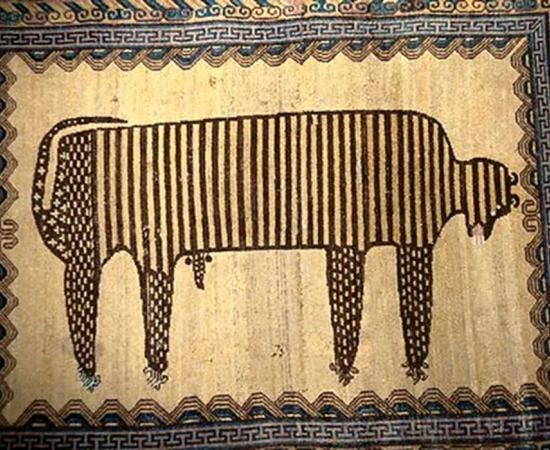 A photo of the sacred cat rug.