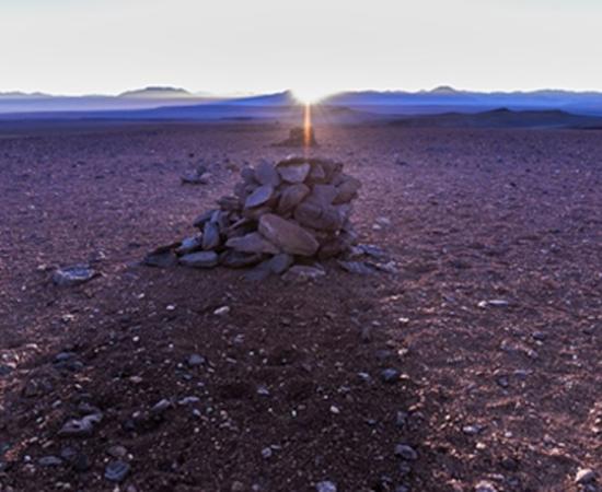 The alignment of the rising sun on the winter solstice with the Saywas in the Atacama desert, Chile.