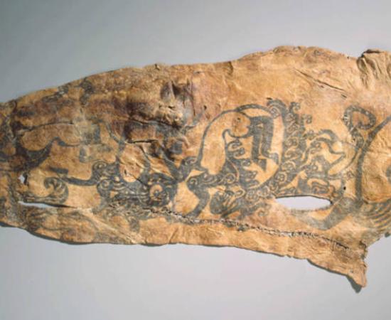 Ancient Pazyryk mummy tattoo on right arm of chief from Pazyryk Barrow no. 2. 