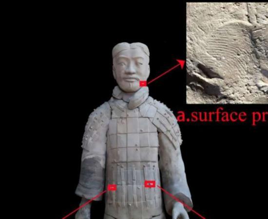 Terracotta figurine and one of the fingerprints on it.  