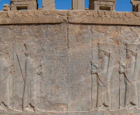 relief at the ancient Persian city of Persepolis (now in modern Iran), including inscriptions in cuneiform, the world’s oldest form of writing. 