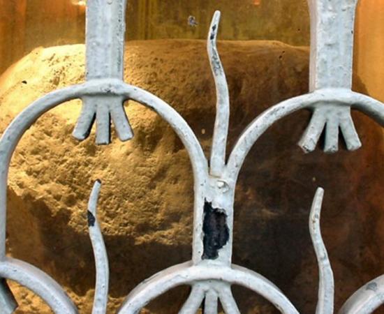 The London Stone, seen through its protective grille. 