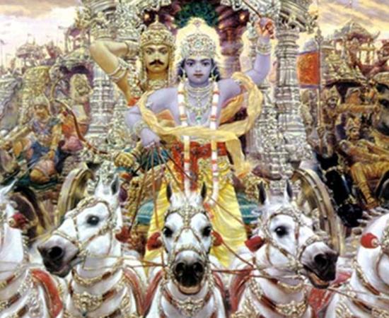 Krishna driving a chariot with Arjun behind in Mahabharata