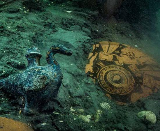 A delicate bronze duck-shaped pourer is discovered amongst ceramics of the 4th century BC on the site of a newly discovered Greek sanctuary to Aphrodite in Thonis-Heracleion. Photo: Christoph Gerigk ©Franck Goddio/Hilti Foundation