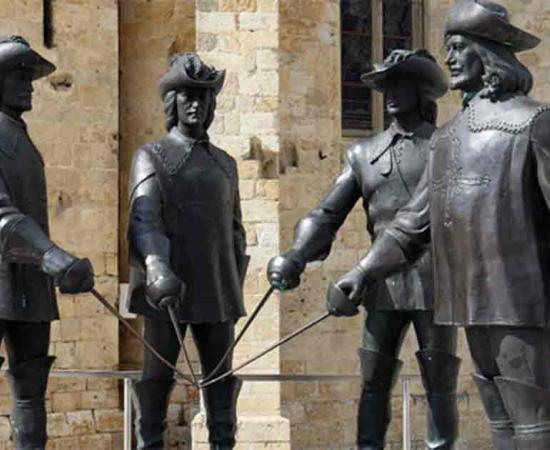 The three musketeers in Condom, France. Source: Migeli Barrios/Adobe Stock