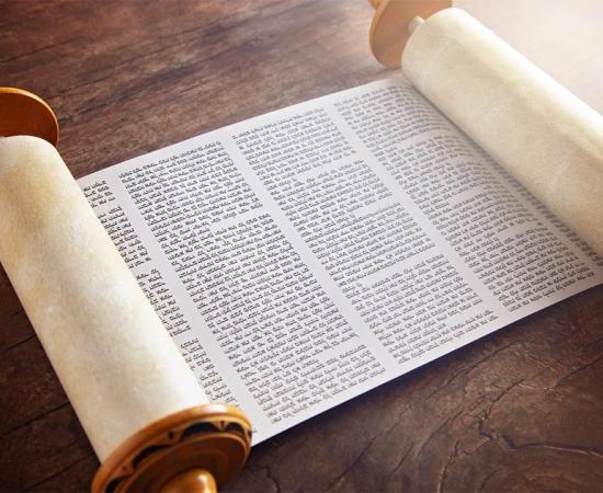 The Sefer Torah, or Toral scroll, is a handwritten copy of the Torah Pentateuch, used for ritual Torah readings, known as parashah. Source: pamela_d_mcadams / Adobe Stock