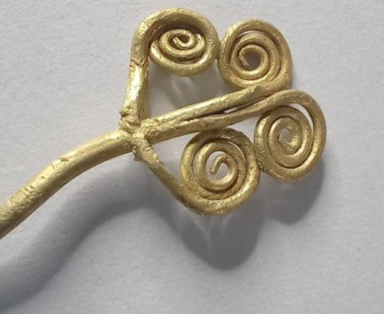 Gold brooch found at the Troy archaeological site in Çanakkale, Turkey. 