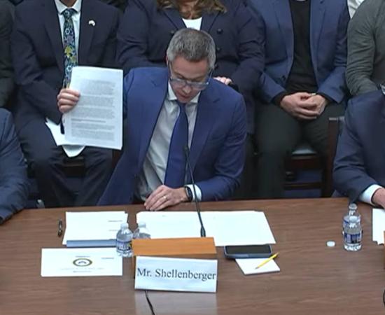 Mr Shellenberger holds up the whistleblower report at the UAP Congressional Hearing.