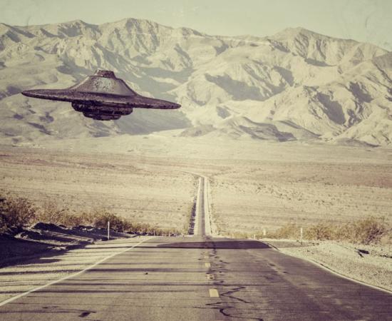 A UFO flying over the New Mexico desert. 