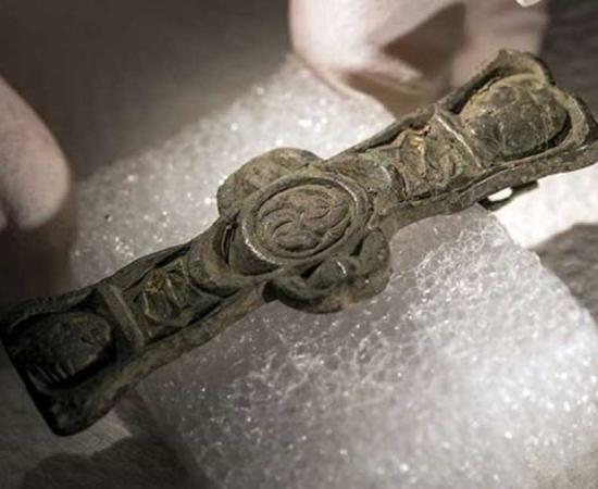 A fitting, probably from a book. The style is typical of Celtic and Irish areas and dates from the 800s. Silver with traces of gilding. Image Credit: Åge Hojem, NTNU University Museum