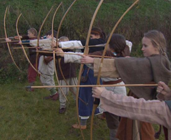 These Norwegian children have traveled back to the Viking Age and practice archery.