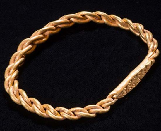 The Viking hoard included a gold arm ring found by metal detectorist Kath Giles. Source: Manx National Heritage Museum