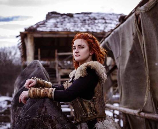 Viking woman enjoying daily pastoral life on the homestead.             Source: selenit / Adobe Stock