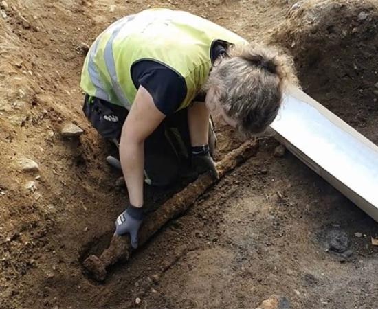 The Viking sword discovery as it was found on the opposite side of a Norse warrior, before Astrid Kviseth placed it in specially prepared padded box.                        Source: Norwegian University of Science and Technology
