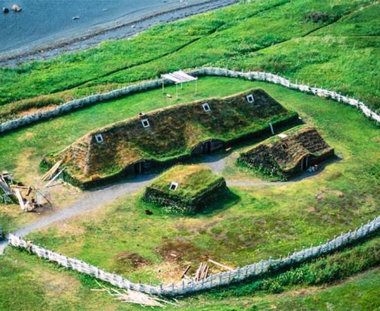 Reconstructed Viking-Age building adjacent to the site of L’Anse aux Meadows. Source: Glenn Nagel Photography / Nature)