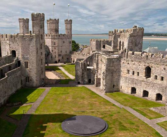 Caernarfon Castle, Wales. Source: peresanz / Adobe Stock.