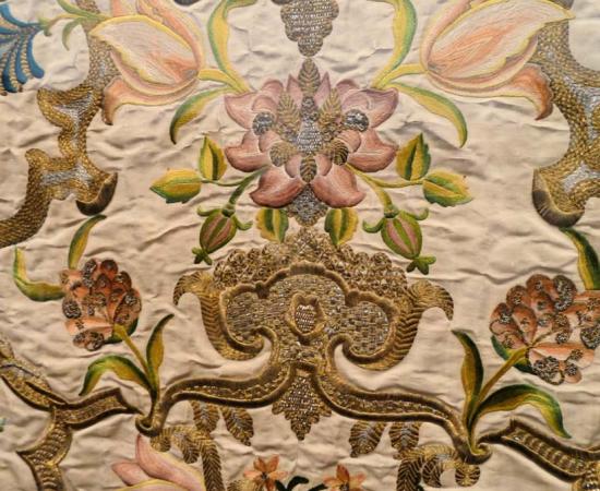 Detail of altar frontal (antependium}, France or Italy, 1730-1740. Silk satin with silk and metallic-thread embroidery, guipure and gaufrure. 