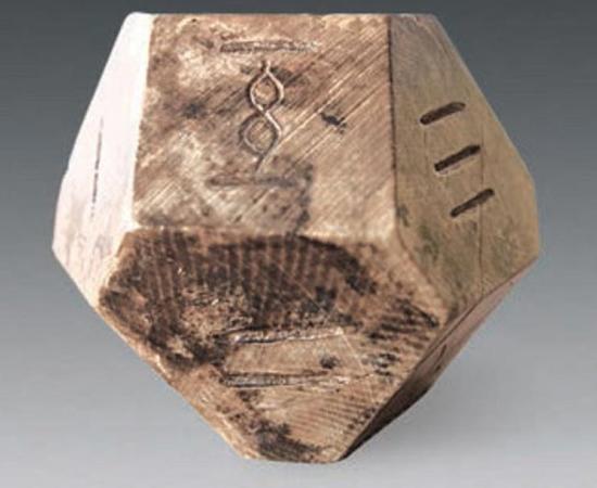 A fourteen-sided die may have been used to play the ancient game of “bo”.