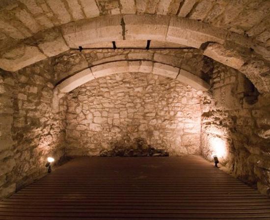 15th century the basement of a "market house" used as a prison 