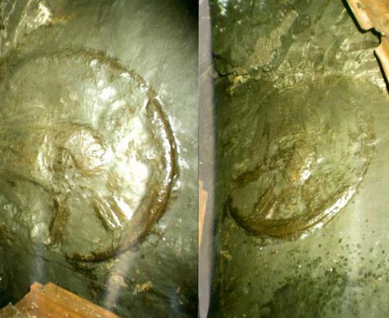 Two photos of the ancient wheel.