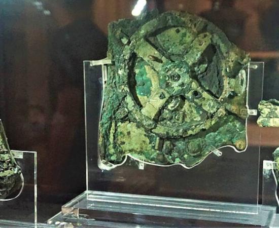 Fragments of the Antikythera Mechanism, an Ancient Greek device long believe to be a type of analog computer, on display at the National Archaeological Museum in Athens.  
