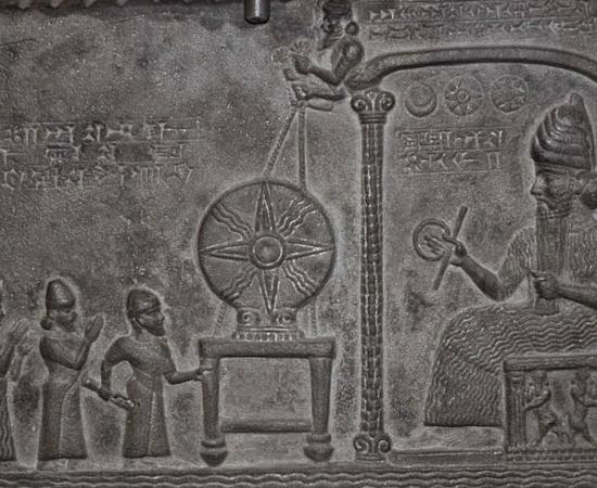 Tablet sculptured with a scene representing the worship of the Mesopotamia Sun-god in the Temple of Sippar.