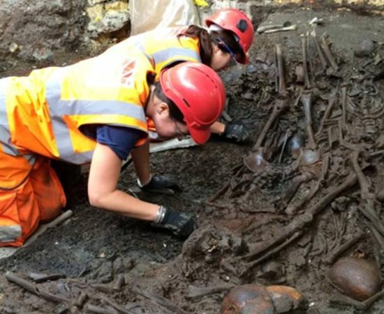 Crossrail archaeologists excavate an apparent mass grave at the Bedlam hospital cemetery
