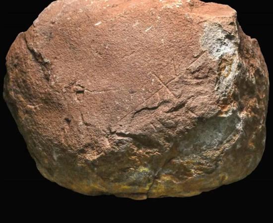 Stone slab with engravings on its surface found in Marbella, Spain