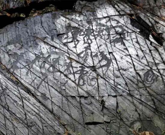 Archeologists and historians examining petroglyphs in the Zhambyl Region. Source:  Department of Internal Policy of the Akimat of the Zhambyl Region