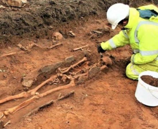 The site includes a cemetery of 18 humans buried from east to west in the Christian fashion from an as-yet undated era. As of press time, bits of bone have been sent off for radio carbon dating. 