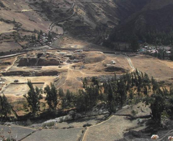 The site of Chavin de Huantar in modern-day Peru, which includes several monumental buildings overseeing a large plaza at an elevation of 10,000 feet (3,000 meters).