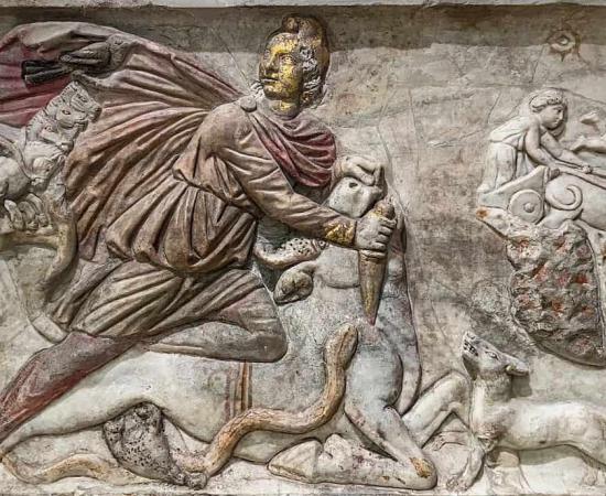A dramatically lit nocturnal photograph of the Trevi Fountain in Rome