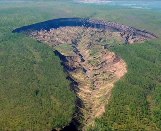 Batagaika started to form in 1960s after a chunk of forest was cleared: the land sunk, and has continued to do so, evidently speeded by recent warmer temperatures melting the permafrost