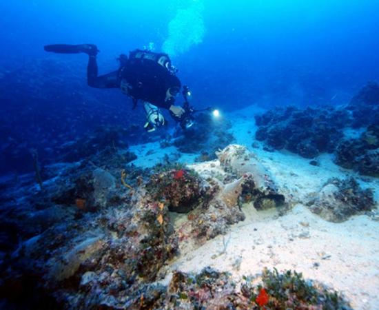 A diver exploring one of the wreck sites. 