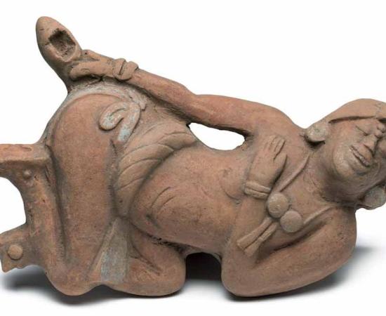 Maya pottery found in Guatemala depicting a man applying a ritual drug enema, from the collection of the Los Angeles County Museum of Art.			Source: Los Angeles County Museum of Art