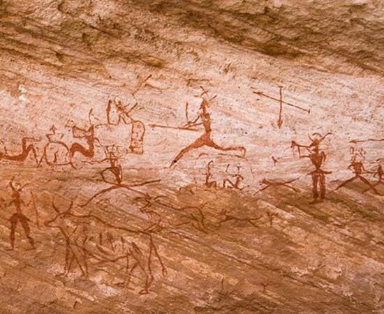 Rock paintings in Tadrart Acacus region of Libya dated from 12,000 BC to 100 AD.