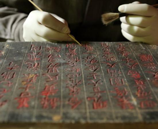 Engraved tablet inside hidden compartment of thousand-hand bodhisattva statue  