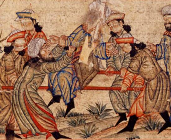 A famous assassin from history, an agent of the Assassins (left, in white turban) fatally stabs Nizam al-Mulk, a Seljuk vizier, in 1092 AD. (14th-century AD manuscript) Topkapi Palace Museum, Istanbul.	 Source: Public Domain