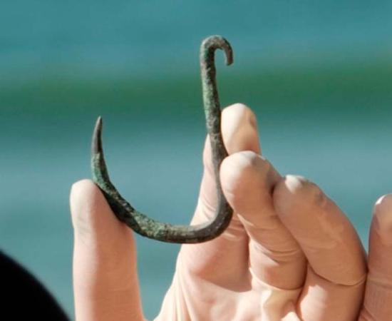An ancient cooper fish hook used to hunt sharks was found on Israeli coasts. Source: Israel Antiquities Authority