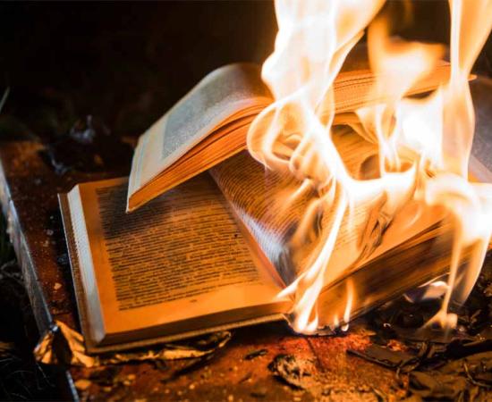 Forbidden books were burned. Their authors exiled, imprisoned and even killed throughout history. Source: de Art/Adobe Stock