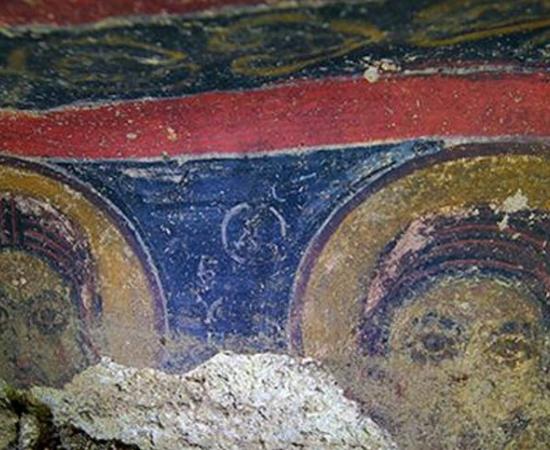 Two of the frescoes from the church, which is in a region of 200 underground villages and tunnel towns. 