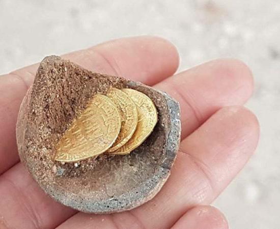 The Yavne gold coins were found during the Jewish holiday Chanukah. (Liat Nadav-Ziv / Israel Antiquities Authority)