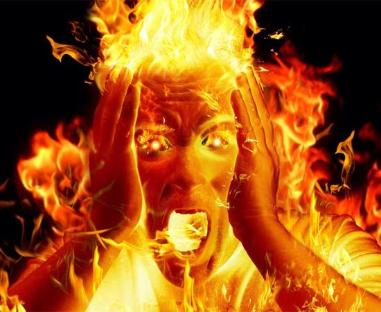 Man on fire showing representation of one of the victims at the Ball of the Burning Men (‘Bal des Ardents’)     Source: Daniele Depascale / Adobe stock