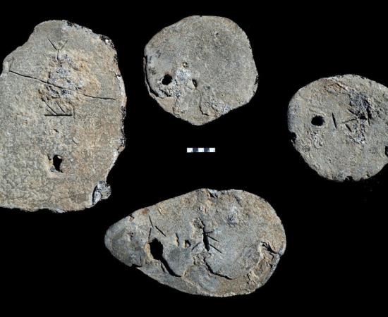  The four lead ingots discovered in a shipwreck off the coast of Israel. Source: Ehud Galili / University of Haifa’s Institute for Maritime Studies
